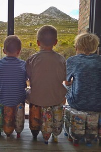 Boys sitting on Ecobrick stools